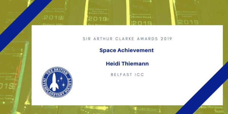 A white card that says Sir Arthur Clarke Awards 2029, Space Achievement, Heidi Thiemann, Belfast ICC